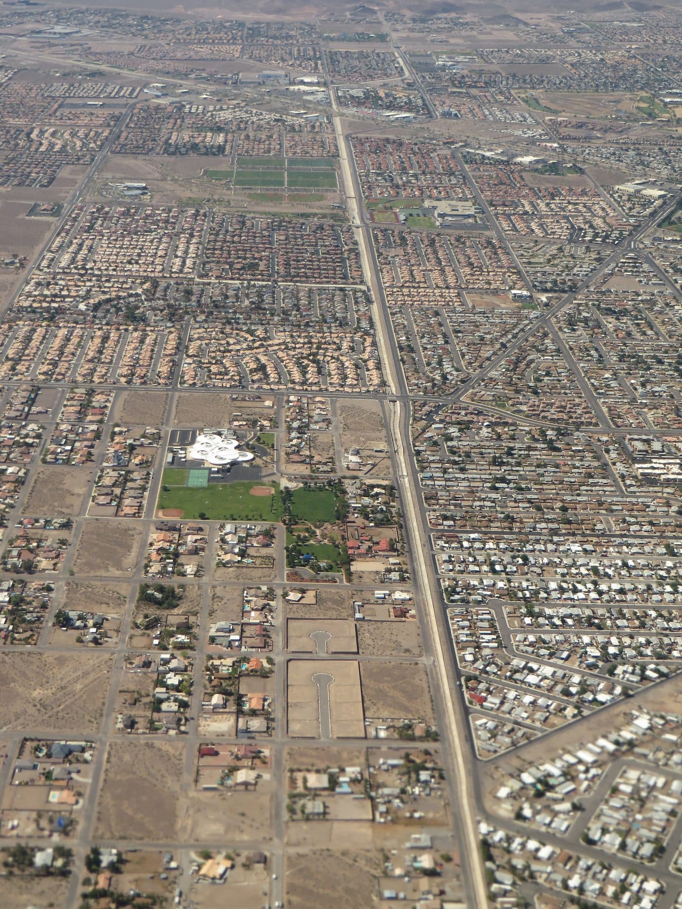 Aerial view of a Henderson residential neighborhood with a community park and school